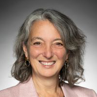 Minister Dabrusin wearing a pink blazer